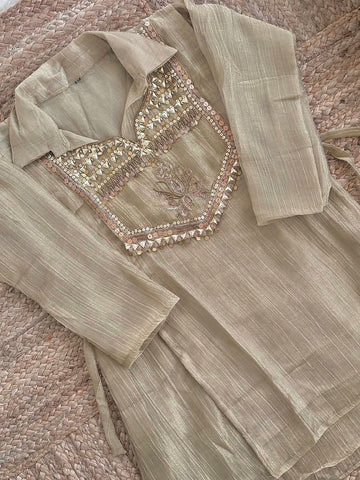 The Golden Sand Tissue Silk Co-Ord Set ✨ – Metallic Beige Shirt-Style Short Kurti with Embellished Sequin Yoke & Side Tie-Ups