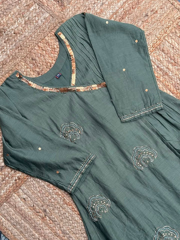 The Olive Green Tissue Silk Suit Set - Pleated V-Neck Flared Kurti, Straight Pants & Matching Dupatta